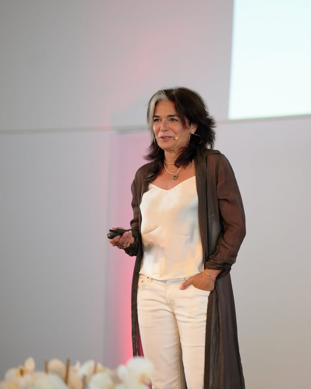 Nat Niddam speaking on stage